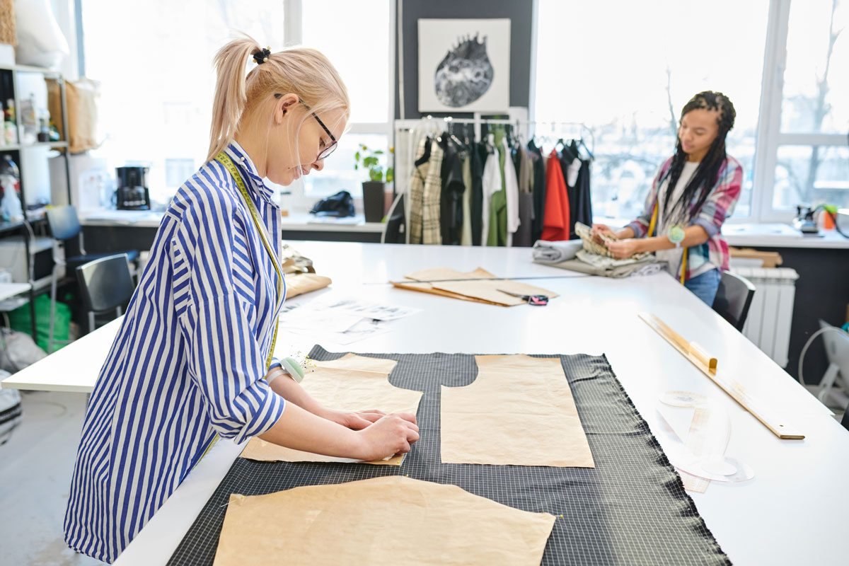 demo-attachment-452-dressmakers-working-in-atelier-8FJWN2X